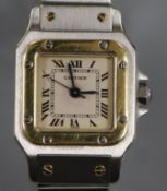 A lady's stainless steel and yellow metal Santos De Cartier automatic wrist watch, no box or
