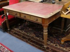 A Victorian Gillows style mahogany partner's writing table W.136cm