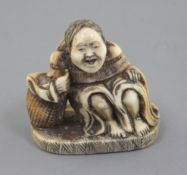 A Japanese ivory netsuke of Shojo, Meiji period, signed Ryumin, seated, resting on a barrel, h. 3.