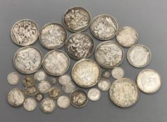 A group of UK silver and bronze coins George III to George VI including an 1844 crown, edge knocks