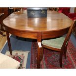 A George III mahogany D end dining table (one spare leaf) 164cm extended