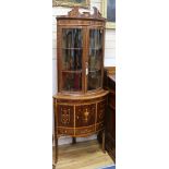 A 19th century Sheraton design marquetry inlaid mahogany bowfront corner display cabinet W.74cm