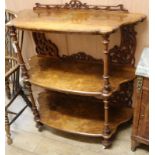 A Victorian walnut three tier whatnot W.107cm