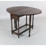 A late 17th century oak gateleg table, with oval top and frieze drawer, W.2ft 9in. H.2ft 4in.