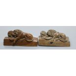 A pair of Italian carved walnut lions, after Thorvaldsen length 9.5cm