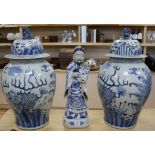 A pair of modern Chinese blue and white baluster vases and a blue and white figure of a sage holding