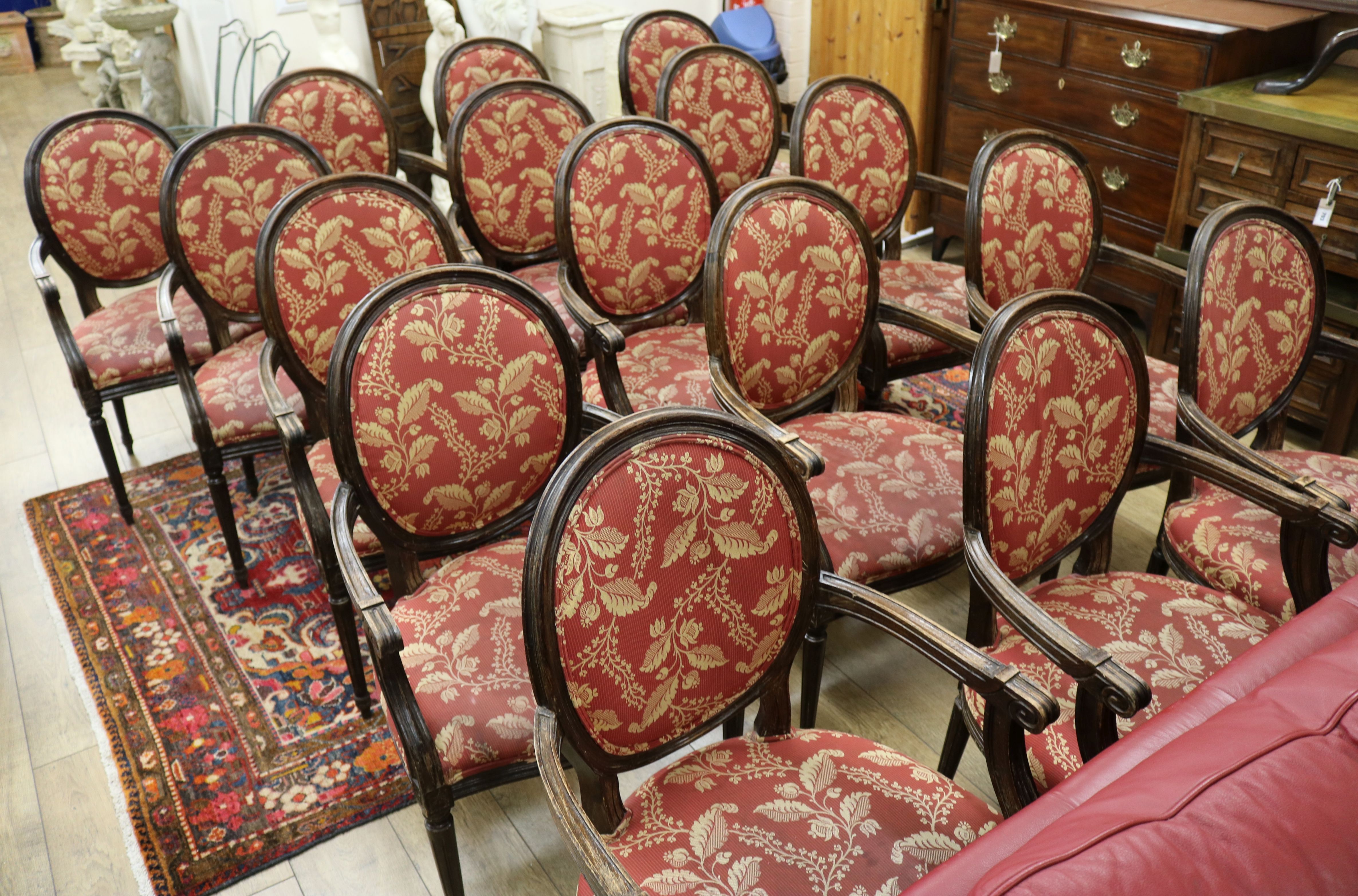 A set of sixteen Louis XVI style beech fauteuil armchairs