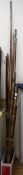 Five vintage fishing rods including bamboo and cane examples