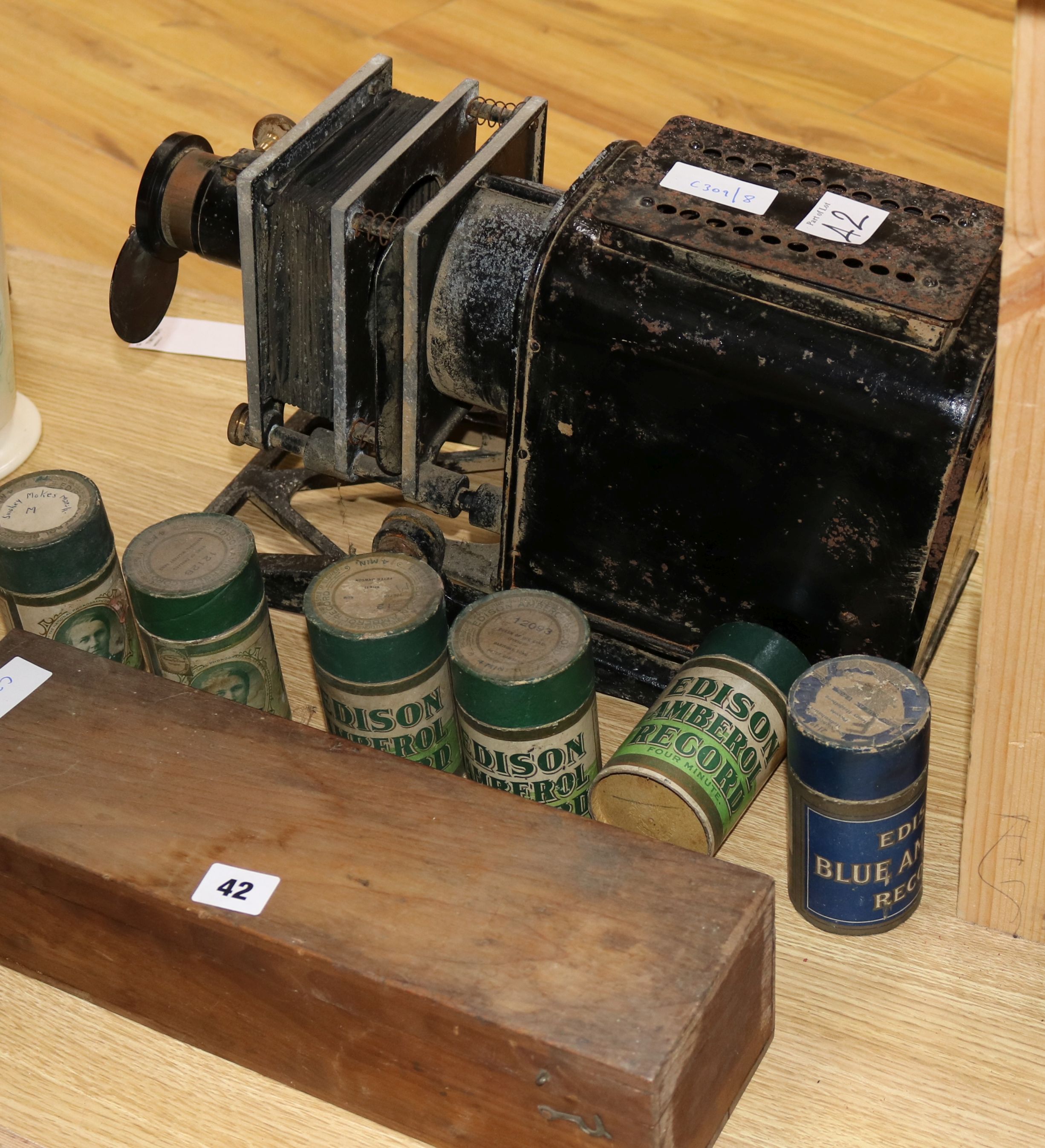 A magic lantern, lantern slides and six phonograph cylinders