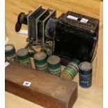 A magic lantern, lantern slides and six phonograph cylinders