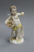 A Meissen figure of a child with flowers height 14cm