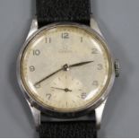 A gentleman's late 1940's stainless steel Omega manual wind wrist watch, movement c. 30T2 PC, on