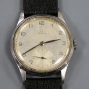 A gentleman's late 1940's stainless steel Omega manual wind wrist watch, movement c. 30T2 PC, on