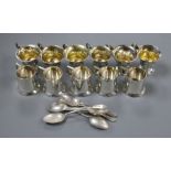 A set of five Edwardian miniature mugs, Deakin & Francis, Birmingham, 1911, a set of six silver