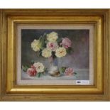 E.J.Beck, oil on canvas, Still life of roses, signed, 30 x 40cm.