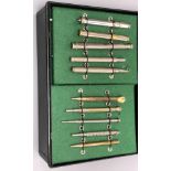 A collection of vintage propelling pencils in a tin case (57)