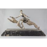 Jean Lormier (French 19th/20th century). An Art Deco patinated bronze group of a young lady with a