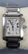 A gentleman's stainless steel Cartier Tank chronograph quartz wrist watch, with Cartier pouch, no