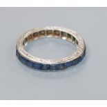 A white metal and sapphire set full eternity ring, size G.
