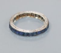 A white metal and sapphire set full eternity ring, size G.