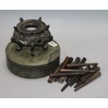 A Chinese slate ink pot, a carved stand and a collection of stringed instrument pegs