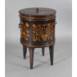 A late 18th century Dutch mahogany and marquetry cellaret, of cylindrical form, with floral