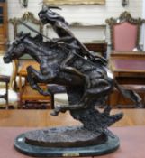 After Frederick Remington. A bronze group, "Cheyenne", on black marble plinth height 80cm