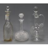 Two glass decanters and a claret jug