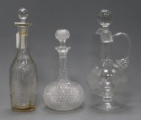 Two glass decanters and a claret jug