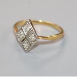 A 1920's/1930's 18ct gold, platinum and four stone diamond ring, of diamond shape, size I.