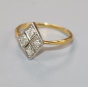 A 1920's/1930's 18ct gold, platinum and four stone diamond ring, of diamond shape, size I.