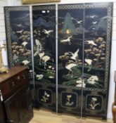 An Oriental four fold lacquer screen W.162cm