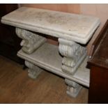 A pair of reconstituted stone Roman garden seats W.98cm