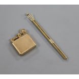 A small 1930's engine turned 9ct gold mounted lighter and a let 9ct gold swizzle stick.