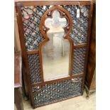 A set of three carved hardwood Moorish style wall mirrors W.67.5cm