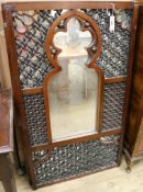 A set of three carved hardwood Moorish style wall mirrors W.67.5cm