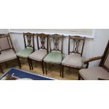 An Edwardian marquetry inlaid mahogany six piece boudoir suite, consisting of a lady's and