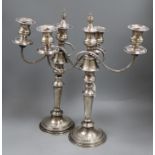 A pair of two branch three light plated candelabra height 45cm