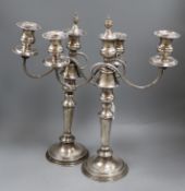 A pair of two branch three light plated candelabra height 45cm