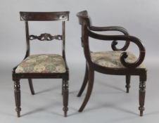 A harlequin set of twelve (6 + 6) William IV mahogany dining chairs, including two carvers, with