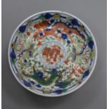 A Chinese wucai 'dragon and phoenix' saucer dish, Kangxi mark, 19th century diameter 13.5cm