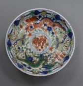 A Chinese wucai 'dragon and phoenix' saucer dish, Kangxi mark, 19th century diameter 13.5cm