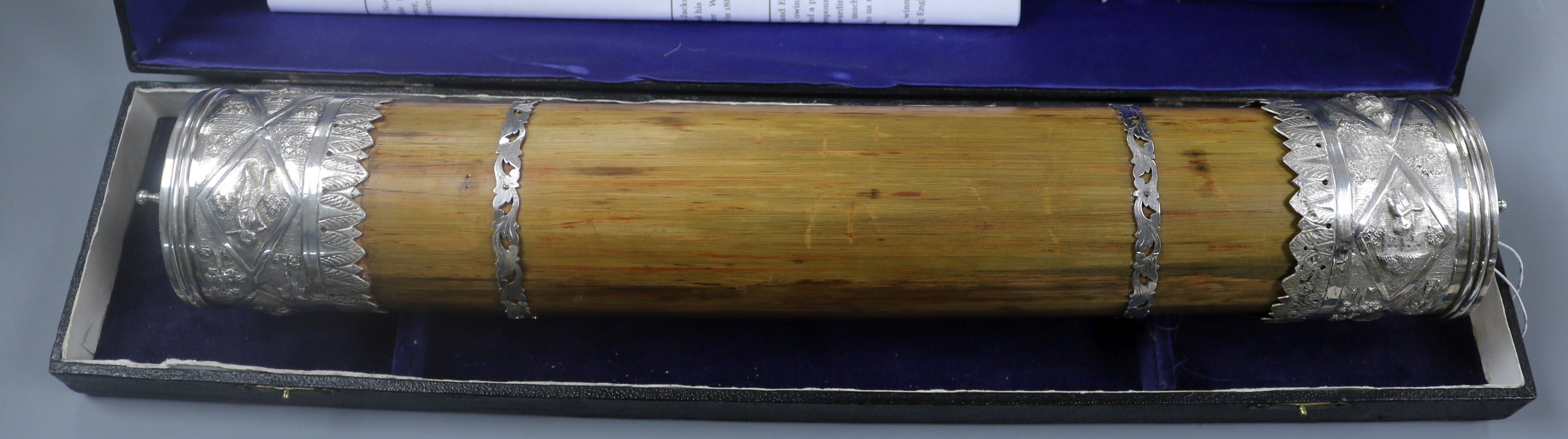 An early-mid 20th century Indian white metal mounted wooden cylindrical scroll case, " Presented