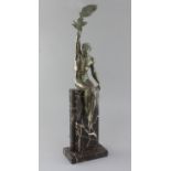 Pierre La Faguays. An Art Deco green patinated spelter figure, 'La Gloire', seated holding a