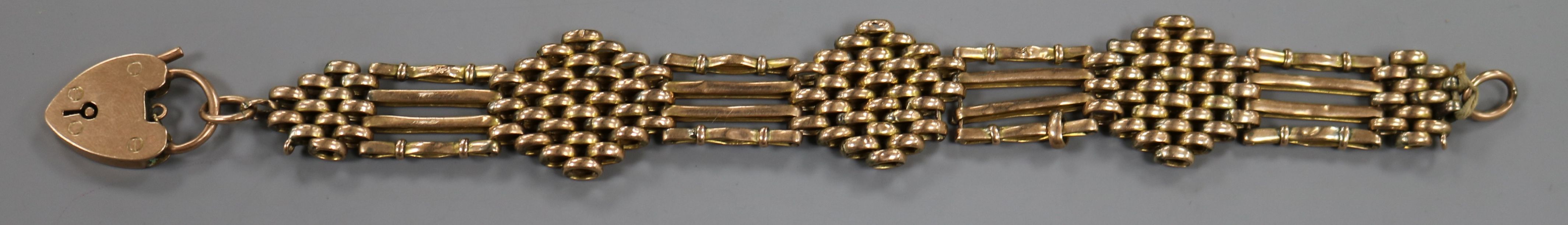 An early 20th century 9ct gold gate and fancy link bracelet, approx. 19cm.