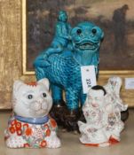 A stoneware Dog of Fo, a Sampson style Buddha and a decorative cat
