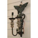 A pair of French cast iron twin serpent wall lights