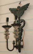 A pair of French cast iron twin serpent wall lights