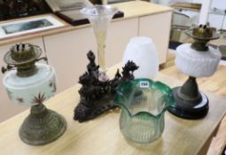 Two Victorian oil lamps and a centrepiece