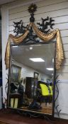 A wrought iron and gilt swag "coral" frame wall mirror W.101cm H.175cm